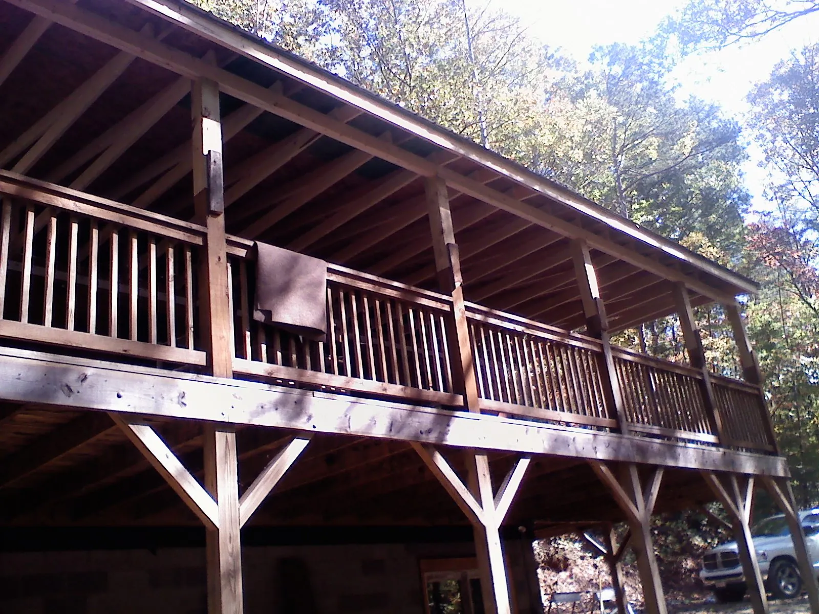 Timber framing under a new elevated porch and deck — Roof Leak Repair in Shickley by Roofing Brothers